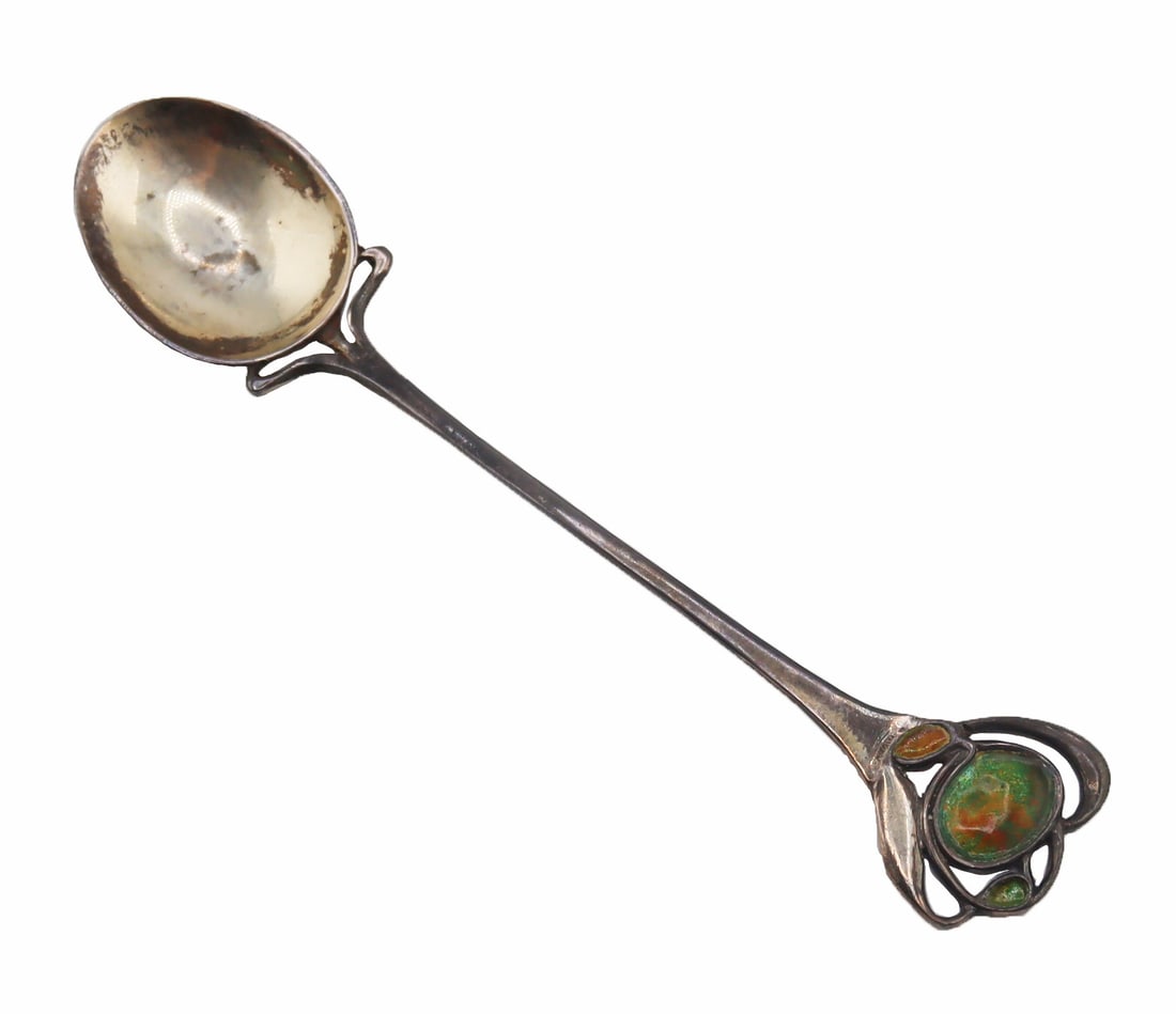 SILVER. Liberty & Co. Cymric Enamel Spoon.: Archibald Knox for Liberty & Co. "Cymric" sterling spoon with enamel decoration. Stamped, "L&Co CYMRIC" with English silver stamps of Birmingham, and a date letter of 1901.