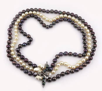 JEWELRY. 14kt Gold, Pearl, and Diamond Necklace.: Triple strand necklace comprised of (2) individually knotted strands of black pearls and (1) individually knotted strand of white pearls with a 14kt white gold, keshi pearl, Old European cut diamond a