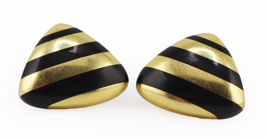 JEWELRY. Pair of Angela Cummings 18kt Gold and: Black Onyx Earrings. Pair of Angela Cummings 18kt yellow gold and black onyx striated earrings. One earring is inscribed verso, "18kt ©; the second earring is inscribed verso, "Cummings