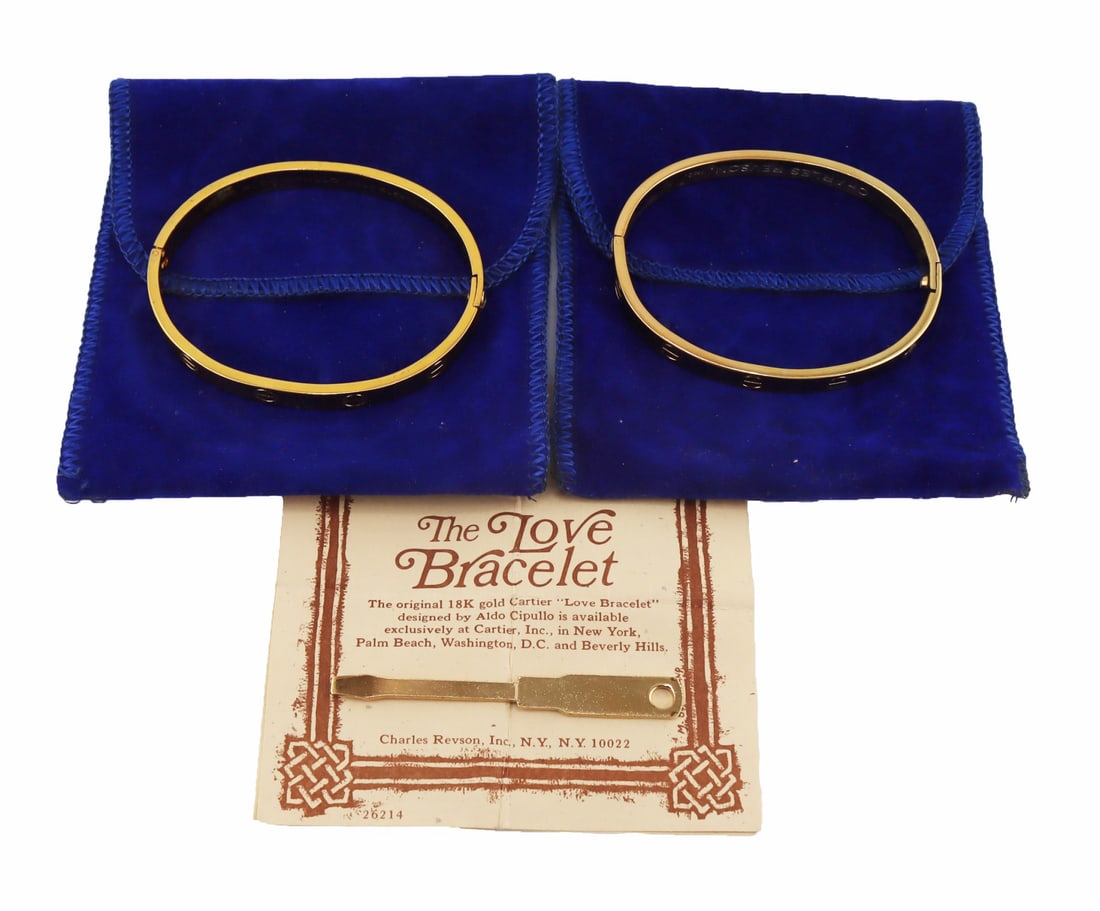 JEWELRY. (2) Charles Revlon Inc. "Love" Bracelets.: Includes (2) Charles Revlon Inc. gold electroplate "Love" bracelets. Accompanied by (2) original dust bags, (1) screwdriver, and a "The Legend of The Love Bracelet" pamphlet. Inter