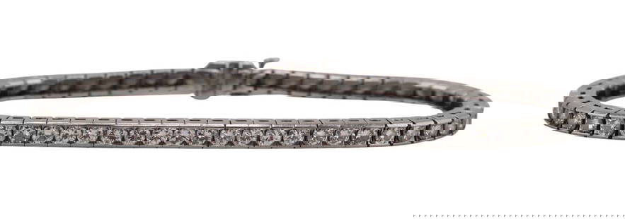 JEWELRY. Platinum and 4.5ct Diamond Line Bracelet.: Platinum line bracelet displaying (60) flush set round brilliant cut diamonds. Stamped, "10% Irid. Plat." with an additional stamp of, "3228". Total of (60) round brilliant cut dia