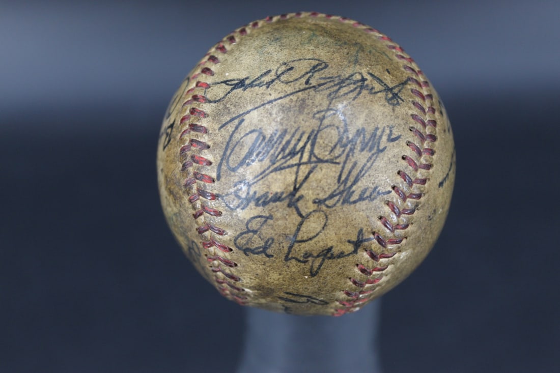 1948 or 1949 New York Yankees Team Signed Baseball: A 1948 or 1949 Team Signed Baseball from the New York Yankees. Legible signatures include Bobby Brown, Charlie Keller, Cliff Mapes, Frank Shea, Vic Raschi. 21 signatures in total. No Babe Ruth signatu