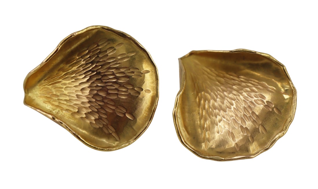 JEWELRY. Angela Cummings for Tiffany & Co 18kt: Gold Petal Earrings. Each earring is stamped, " © 1979 18kt Tiffany & Co". Total approx. weight of the pair of earrings is 6.7 dwt (gross). From a Larchmont, NY estate. Dimensions: