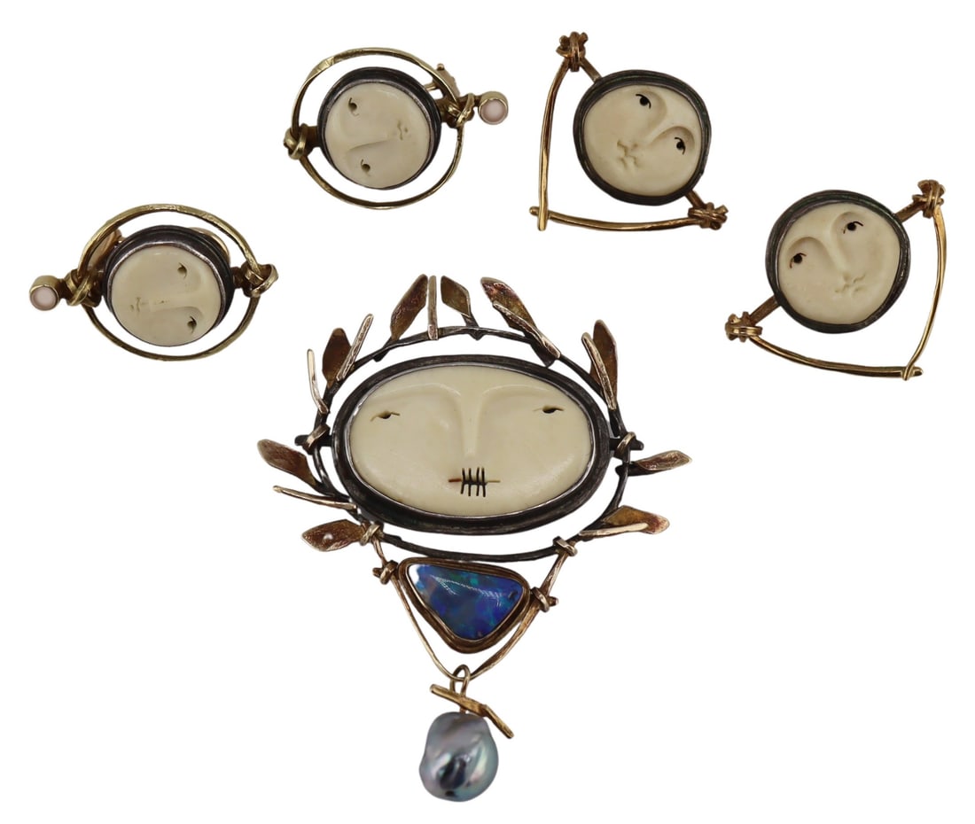 JEWELRY. Carolyn Morris Bach Jewelry Collection.: Jewlery collection displaying works by contemporary jeweler Carolyn Morris Bach: including (1) sterling brooch displaying a carved bone face surrounded by 18kt yellow gold leaves, an 18kt yellow gold