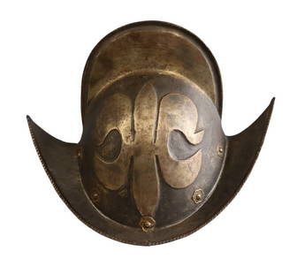 MILITARIA Morion Helmet with Embossed Fleur-de-Lis: A 16th to early 17th century-style Morion steel helmet, featuring a high comb and distinctive upturned brim with rolled edge. The helmet is adorned with repousse fleur-de-lis motifs, likely indicating
