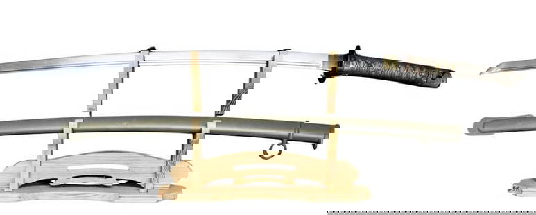 MILITARIA. WWII Japanese Shin-Gunto Type 95 Sword: A Japanese WWII aluminum handle (hilt) third pattern Var#2 top lock Shin-Gunto non-commissioned officer (NCO) type 95 katana sword. Blade (mune) stamped, &quot;6753 3&quot; (note last 3 is backwards)