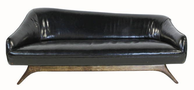 VLADIMIR KAGAN Leather Settee / Chaise.: A rare form by Kagan. Custom for the consignor's mother in leather with a typical Kagan base. Can be used as a settee or a chaise. From a Riverdale, Bronx, NY estate. - Dimensions: 28" x 32" x 82"