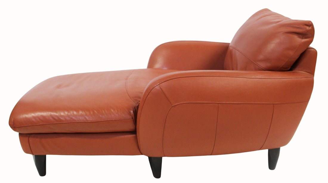 Modern Leather Chaise Lounge.: A modern leather chaise lounge. From a Nyack, NY estate. Dimensions: 37" across the arms, 17" to cushion height. 32" tall x 63" overall.