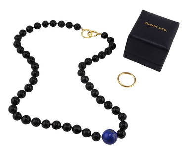JEWELRY. Tiffany & Co. 18kt Gold Jewelry.: Includes an Elsa Peretti for Tiffany & Co. onyx beaded necklace displaying a single Lapis Lazulis bead with an 18kt yellow gold clasp - inscribed, "© 1983 T&Co 18K" and, "P