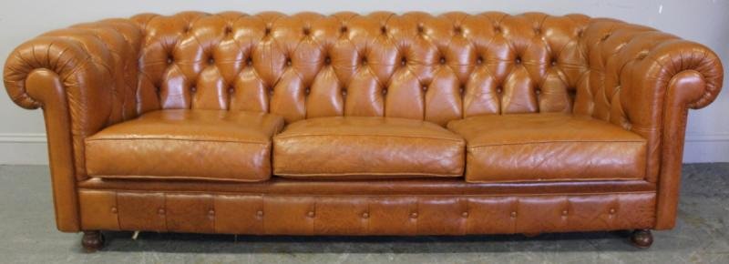 Leather Chesterfield Style Sofa.: Labeled "Preferred Seating." From a Larchmont, NY estate. Dimensions: 85" w x 34" d x 25" h. Condition: Good but used condition; With a couple of drips on one cushion.