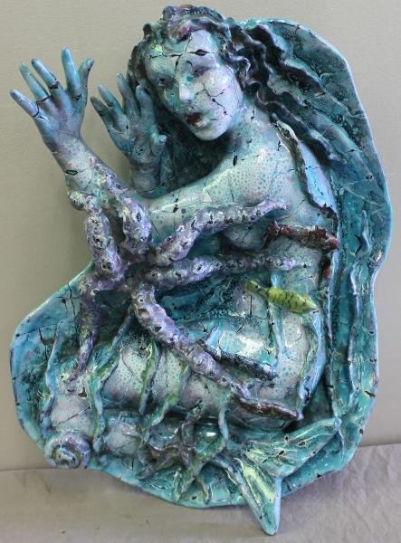 Italian Ceramic Wall Plaque or Sculpture of a: Mermaid. Signed, "San Paoli Italy." From a New Hyde Park, NY location. Dimensions: 16.25" w x 6.5" d x 22.25" h.