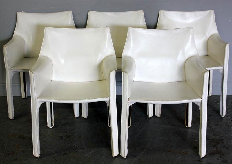 5 Midcentury Leather Chairs Signed Cassina.: From a Central Park West NYC estate. Dimensions: 22.5" w x 18.5" d x 31" h. Condition: Good.