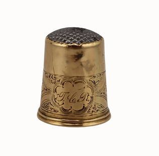 GOLD. Signed A.W. 18kt Gold Thimble.: Signed A.W. 18kt yellow gold thimble with etched floral border and a silver? crosshatch patterned cap. Stamped to the interior, &quot;A.W. 18K I5&quot;. Total approx. weight of the thimble is 1.7 dwt