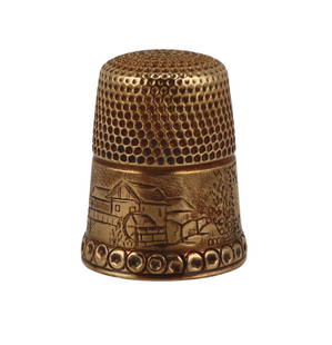 GOLD. Simon Bros. 14kt Gold Village Scene Thimble.: Includes a Simon Bros. 14kt yellow gold thimble displaying an etched scene of a village to the bottom border. Stamped to the interior, &quot;14K&quot; with a maker's mark. Total approx. weight of the