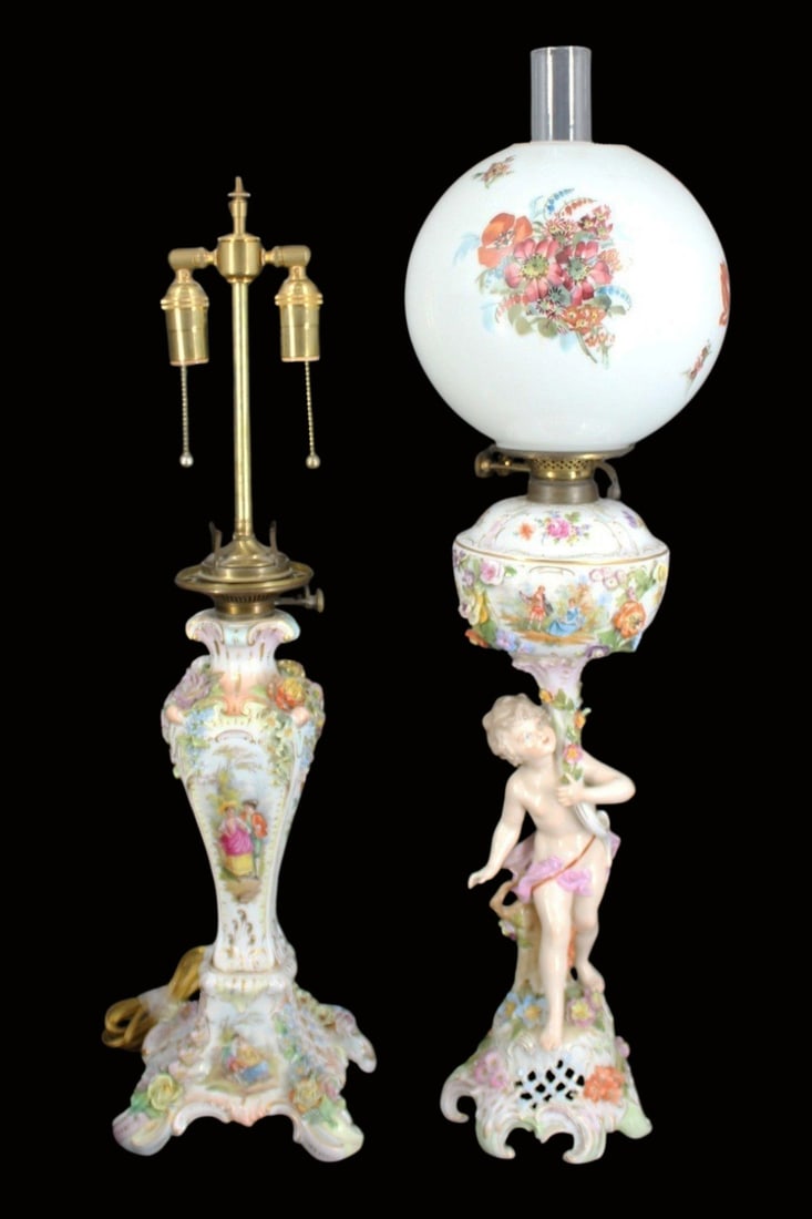 (2) MEISSEN Porcelain Oil Lamps.: 1 figural with globe and the other electrified. From a Long Island, NY estate. Dimensions: Lamp the porcelain 17" & 23" to top of finial; the oil lamp 21" the porcelain and 29 "