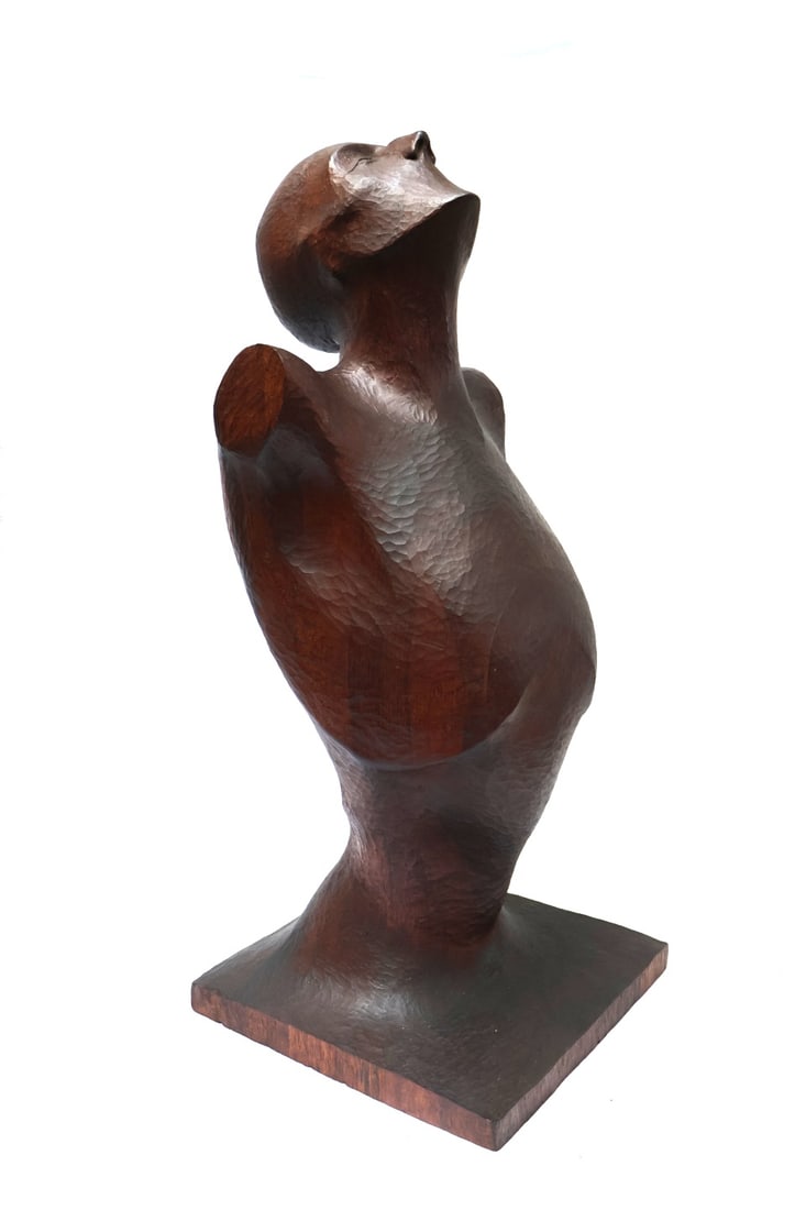 ELLIOT OFFNER (AMERICAN 1931-2010).: 'Asian Man' Mahogany wood. Apparently unsigned. Provenance: Forum Gallery, NYC. Note: Born in New York, Offner specializing in sculpture and printmaking. His artwork took inspiration from the parallel