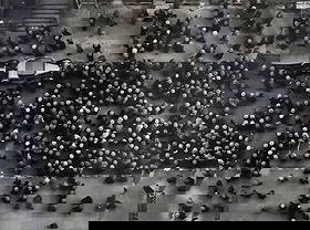 MARGARET BOURKE-WHITE (AMERICAN, 1904-1971).: 'Hats in the Garment District', New York. Gelatin silver print. printed 2000s. Embossed signature lower right. Numbered 89/250 lower left. Property from a Westchester County, NY collection. Dimensions