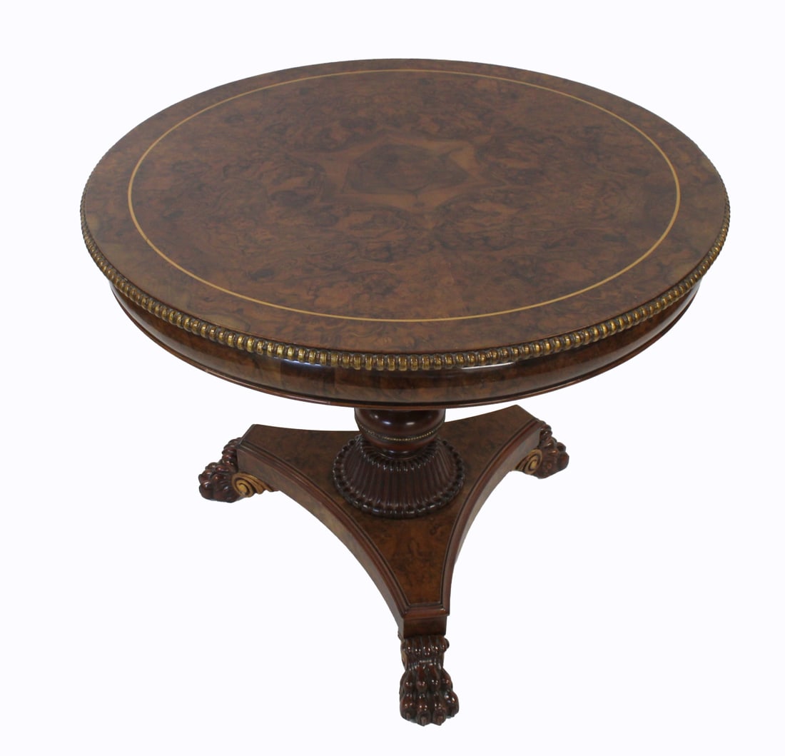 Vintage Walnut Carved & Gilt Decorated Center: Table. Nice quality and grain with pedestal and raised on claw feet . From an Eastside NYC Brownstone. - Dimensions: 29" h x 36" dia.