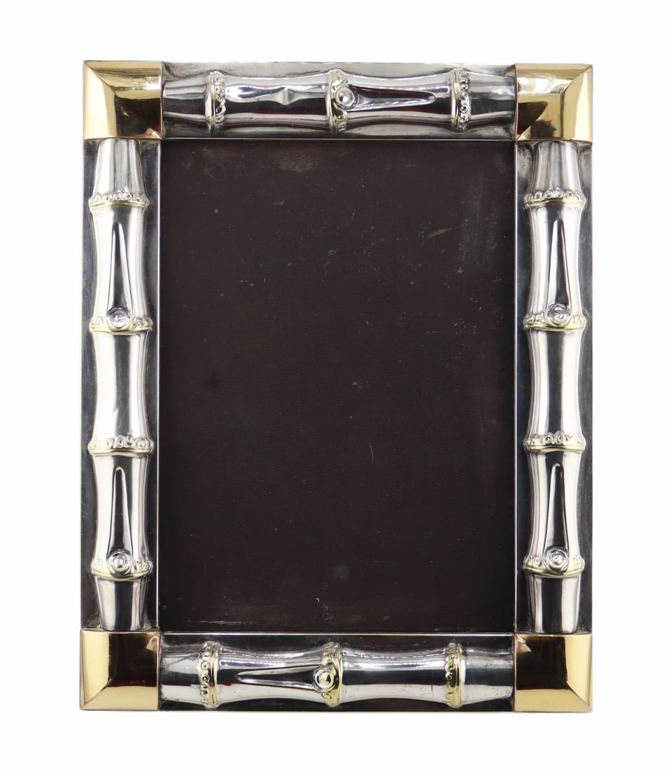 SILVERPLATE. Gucci Italian Bi-color Bamboo Frame.: Signed Gucci silverplate frame with bamboo surround and gilt square accents to each corner. Inscribed, "Gucci Made in Italy". From a Rye, NY estate. Dimensions: frame measures approx. 7.5&qu