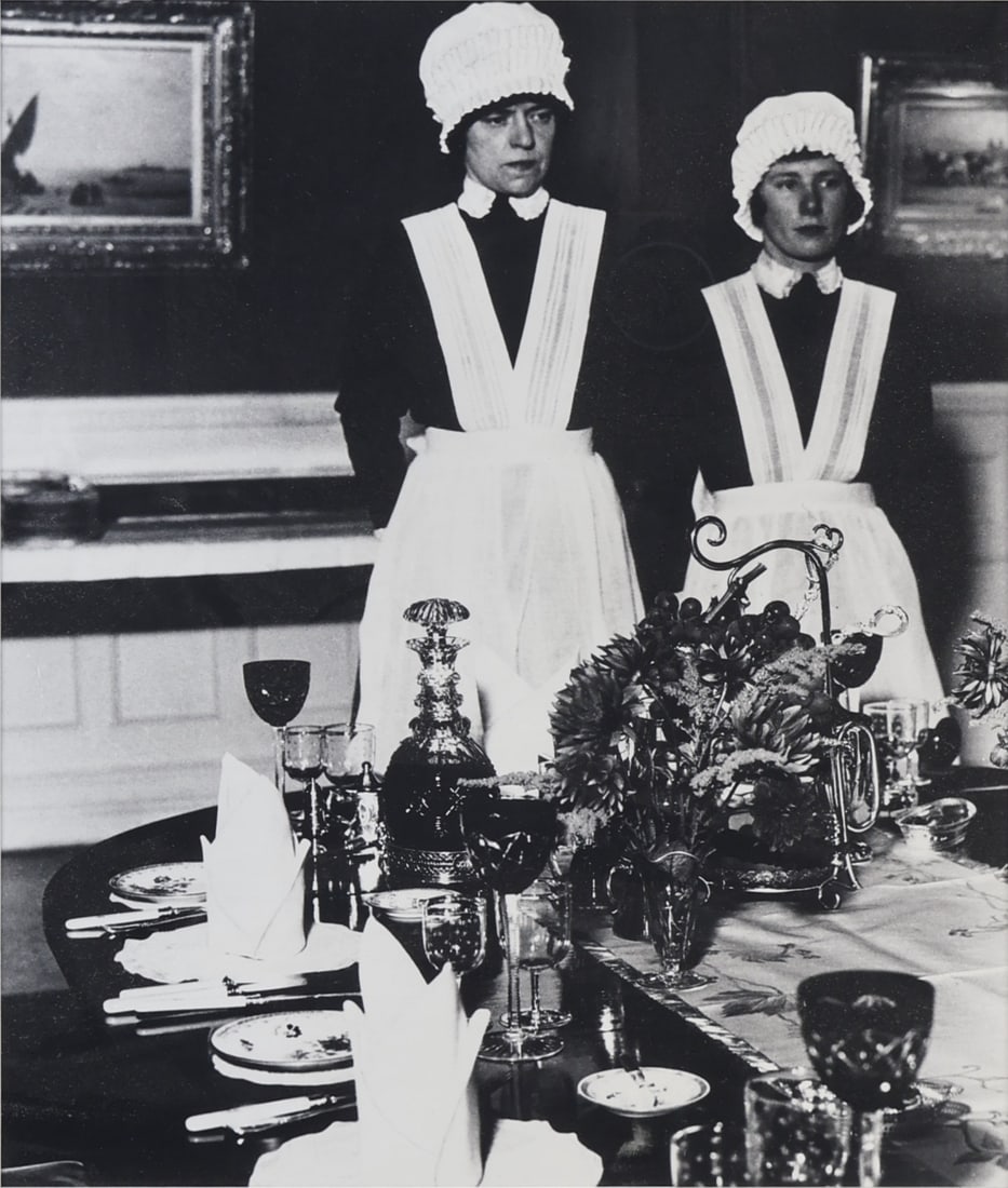 BILL BRANDT (GERMAN/BRITISH, 1904-1983).: 'Parlourmaid and Under-Parlourmaid Ready to Serve Dinner', 1933. Gelatin Silver Print. Signed lower right in ink. Property from a Tarrytown, NY collection. Dimensions: Sight: 14" h x 11.25"