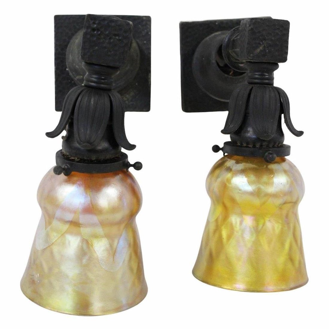 Pr Arts & Crafts Hand Hammered Metal Sconces With: L.C Tiffany Favrile Shades. The hammered sconces apparently unsigned. The 2 shades signed LCT. From a Rye NY estate. - Dimensions: 10" x 7"