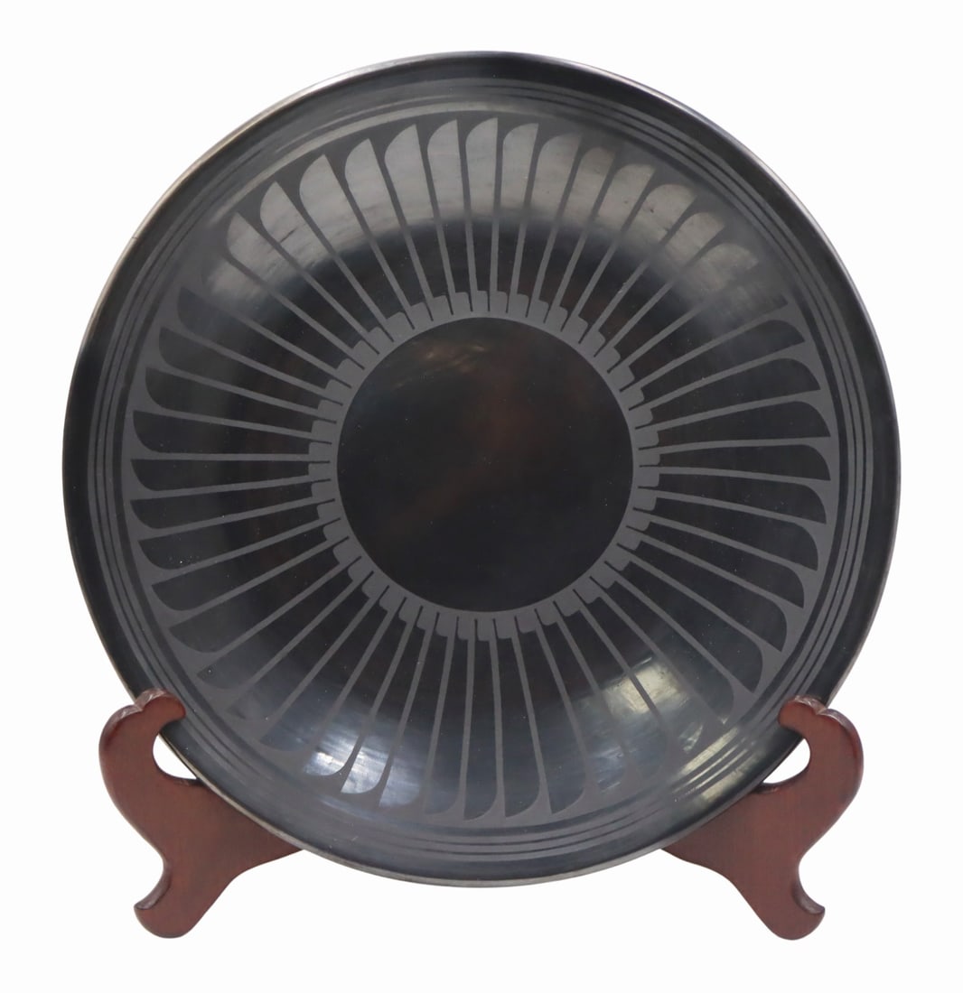 Maria Martinez and Popovi Da Blackware Charger.: Signed to the underside, "Maria Popovi". By consignor provenance this is from the estate of Rosebud Yellow Robe. Dimensions: charger measures approx. 14.5" in diameter.