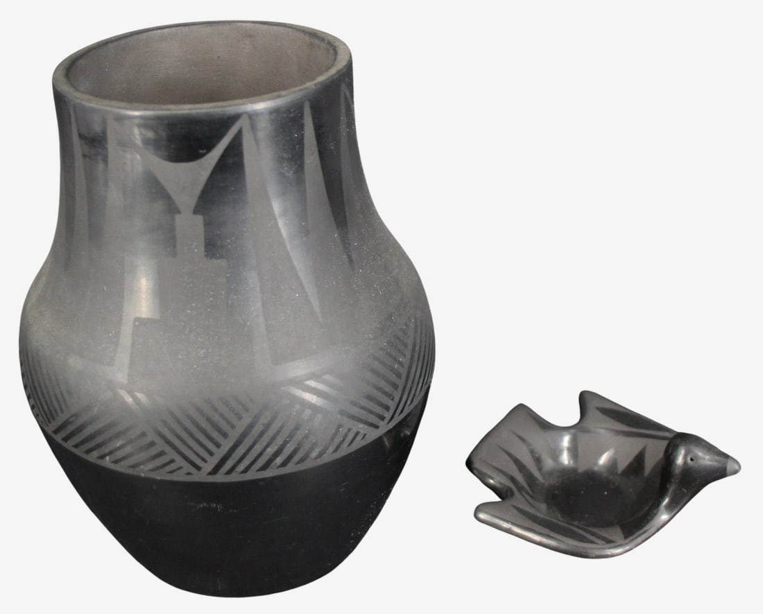 Tonita & Juan Cruz Roybal Black Vase With: another small black on black pottery figure. 1) Black on black decorated pottery vase, 8.25" tall x 7.5" widest (4" outside neck diameter), signed on base "Tonita & Juan"