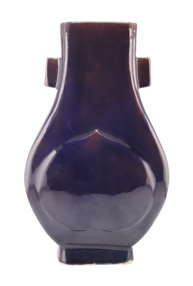 Chinese Flambe Fanghu Vase with Handles.: Chinese aubergine flambe fanghu vase with cigar form style handles and peach blossom style decoration to two sides. From a Flushing, Queens estate. Dimensions: vase measures approx. 10.25" h.