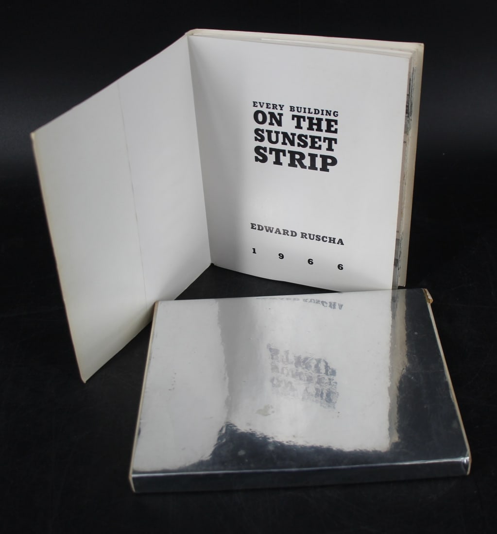 Ed Ruscha The Sunset Strip Book & Slipcase 1966: A fine copy of Ruscha's groundbreaking photographic masterpiece "Every Building on the Sunset Strip". Housed in original Mylar slip case. This copy does not have the additional 2" strip