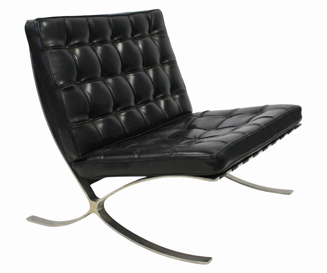 After Mies Van Der Rohe Barcelona Chair.: Nice midcentury chair with metal strapping. From a Nyack, NY estate. - Dimensions: 30" h x 30" w x 30" d.