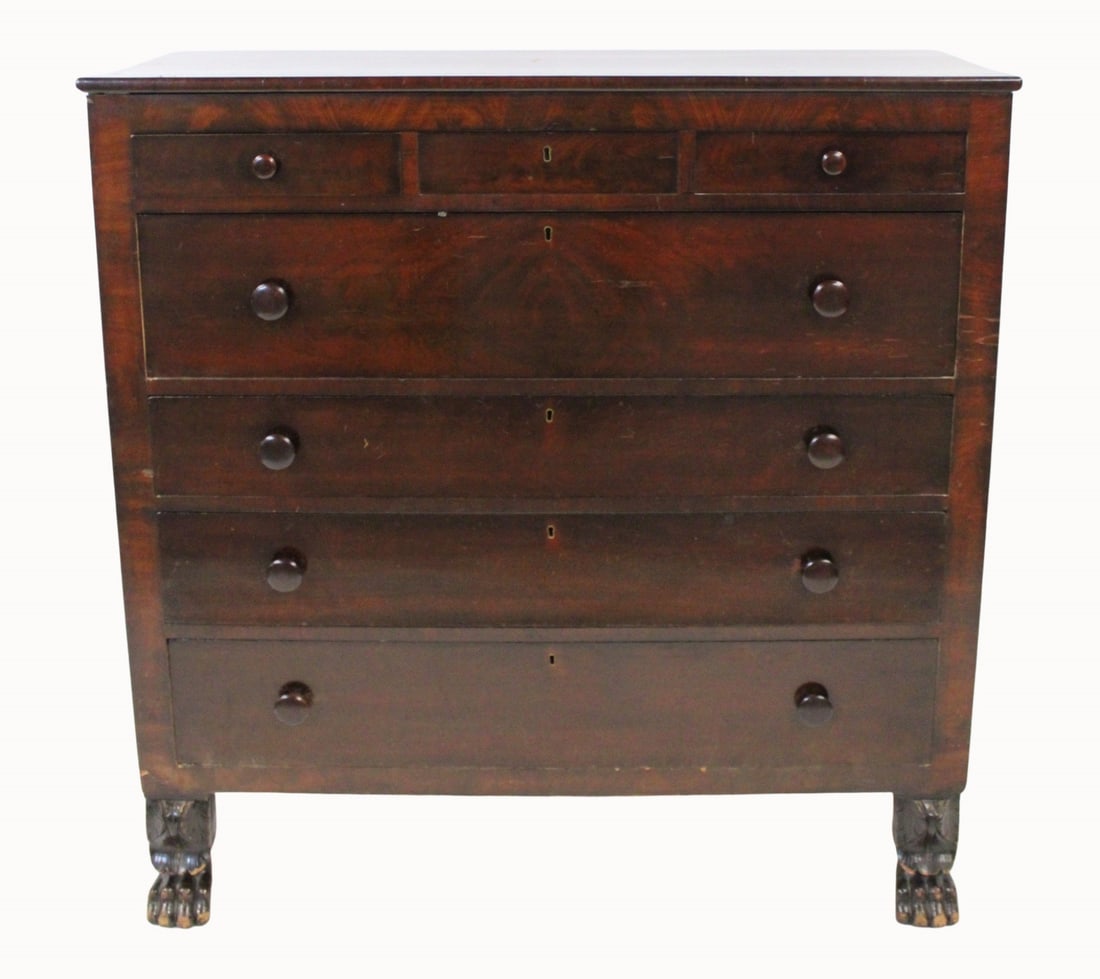 Empire Mahogany Dresser.: Multi drawer and raised on carved claw feet. From a Greenwich, CT estate. - Dimensions: 49" h x 48" w x 21" d.