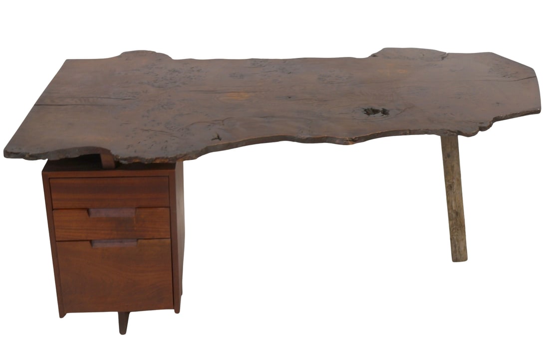 GEORGE NAKASHIMA (American, 1905-1990).: NAKASHIMA STUDIO, Desk with burl slab top. Desk is missing front leg. (See images of original drawing with Nakashima, receipt for desk and pedestal with casters from Nakashima. The Nakashima foundatio
