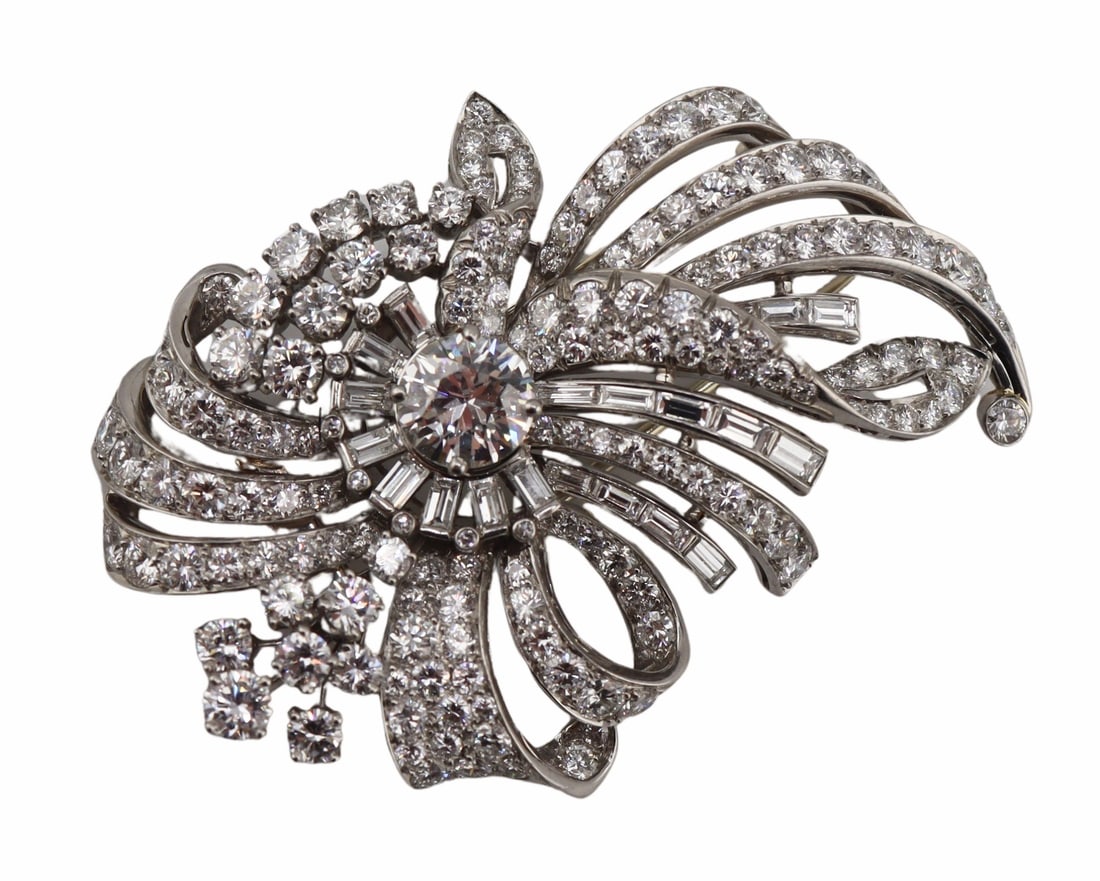 JEWELRY. Platinum and Diamond Spray Brooch.: Largest round brilliant cut diamond measures approx. 8.0mm. In the process of obtaining a GIA Natural Diamond Grading report for the center stone. Total approx. weight of the brooch is 21.0 dwt (gross