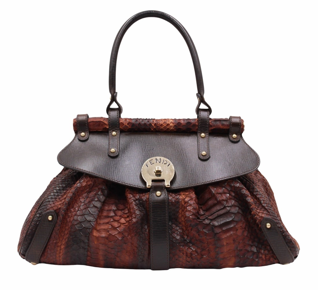 COUTURE. FENDI Medium 'Magic' Python Purse.: Fendi medium 'Magic' brown python handbag purse with gold hardware and brown leather mountings. Accompanied by a Fendi Product Card, no. 8BN144 00RAZ F0EZ5. Accompanied by a From a Westchester County