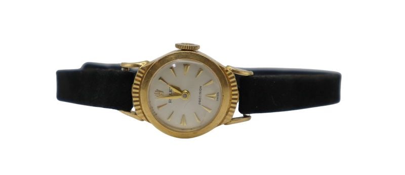 JEWELRY. Vintage Lady's Rolex Precision 18kt Gold: Watch. A vintage ladies’ Rolex Precision 18kt yellow gold watch, Ref. #9285. This watch by Rolex features an 18kt yellow gold 17mm watch case, acrylic crystal, silvered metal dial, applied dagge