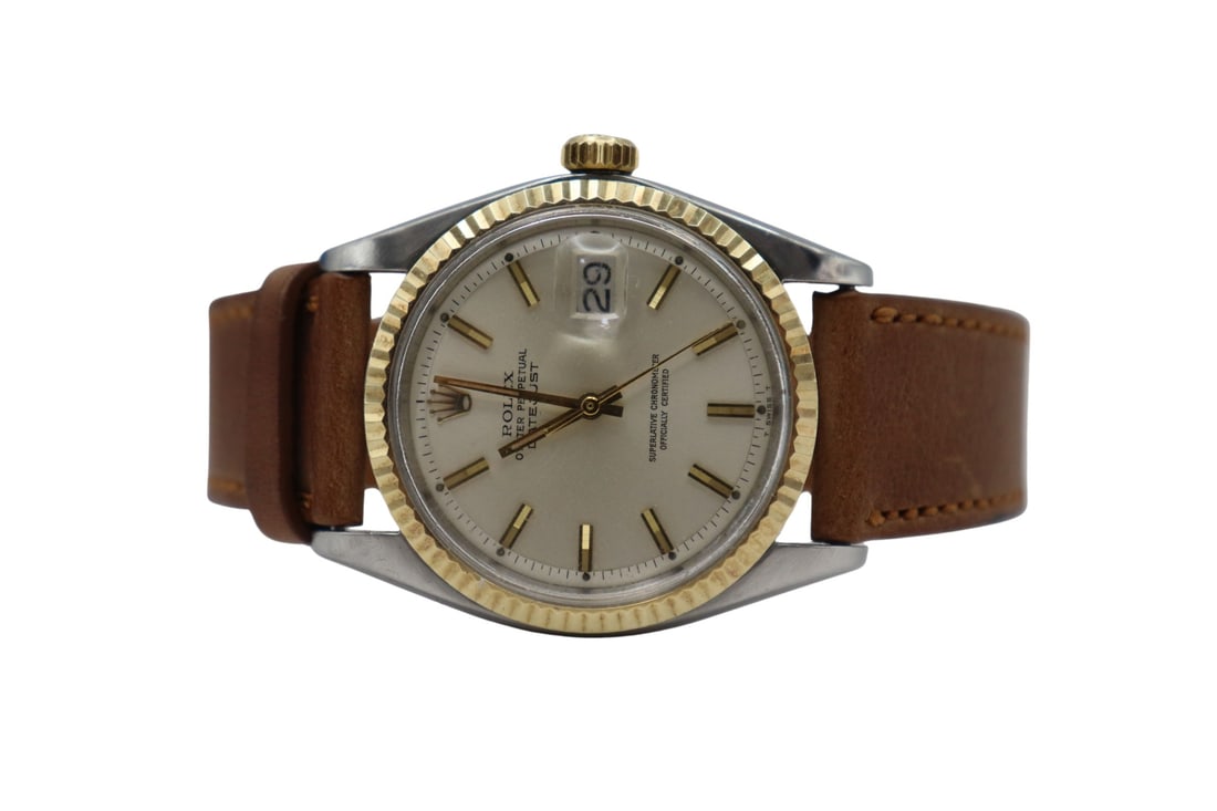 JEWLERY. Vintage Rolex Datejust Two-tone Watch.: A men's vintage Oyster Perpetual stainless steel and 14kt yellow gold watch, Ref. #1601. This Rolex, manufactured in 1970 (based on the serial number: 2445660), features a 36mm stainless steel case (h