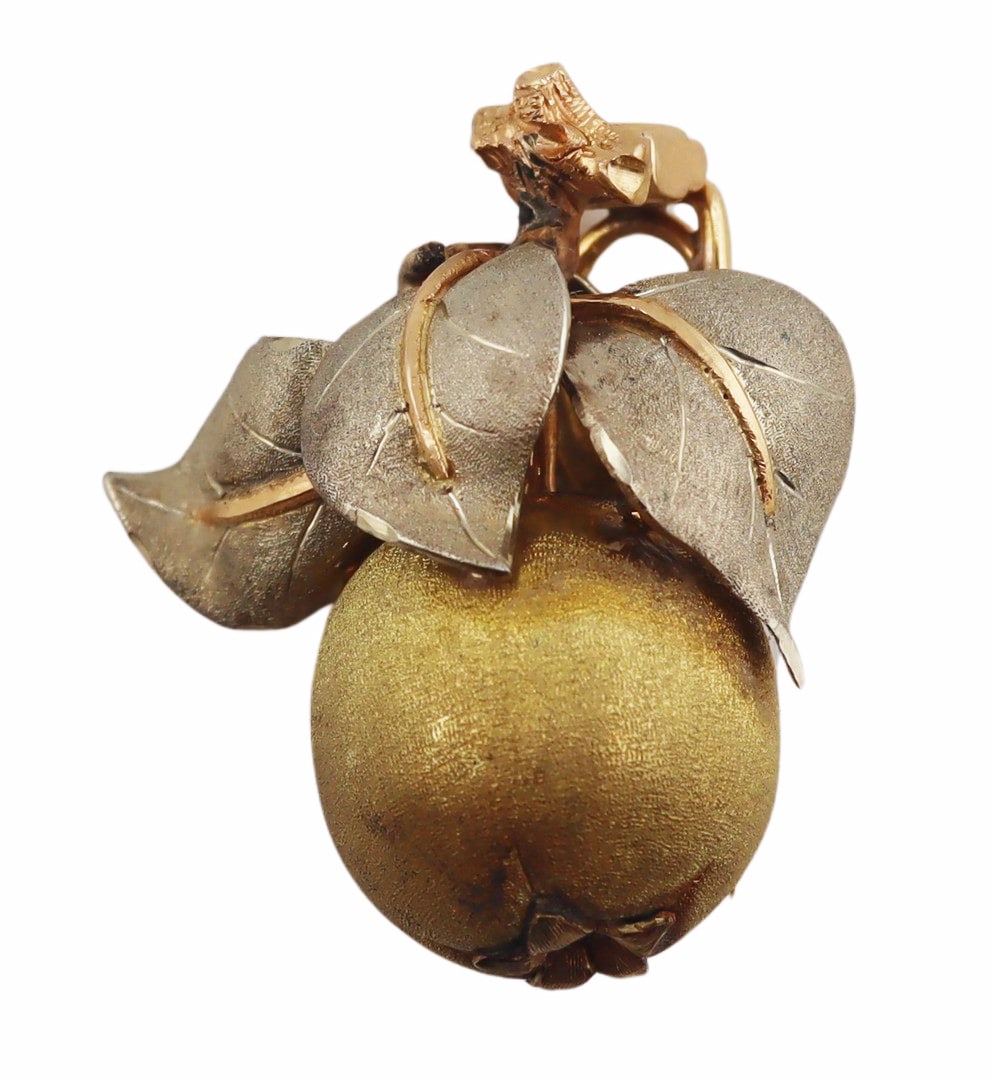 JEWELRY. Buccellati 18kt Gold Apple Brooch.: Buccellati 18kt yellow, white and rose gold brooch in the form an apple with leaves displaying a beautifully textured finish. Inscribed, "Buccellati". Total approx. weight of the brooch is 8