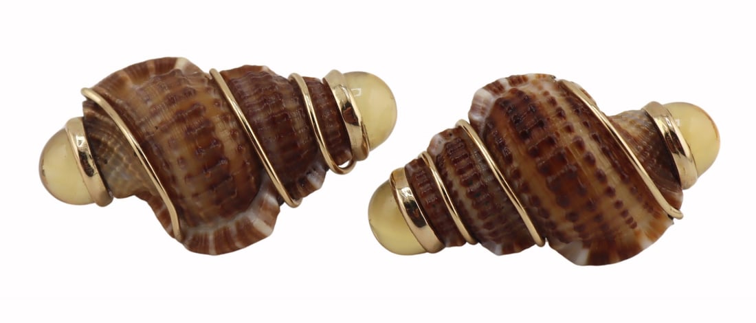 JEWELRY. Pair of MAZ 14kt Gold, Shell and Gem: Earrings. Pair of MAZ 14kt yellow gold mounted shell form earrings accented by bezel set yellow gem cabochons to each terminal. Stamped, "MAZ 14K". Total approx. weight of the pair of earrin