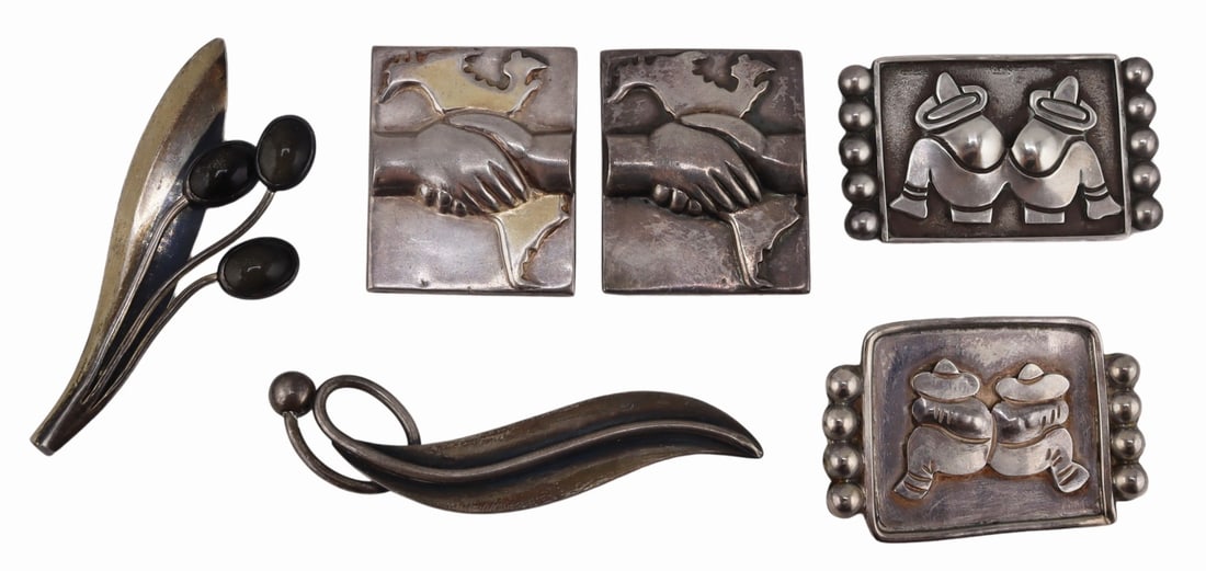 STERLING. (3) William Spratling Mexican Sterling: Brooches. Includes (2) William Spratling sterling rectangular "Continental Solidarity" brooches depicting clasped hands above North and South America - marked verso; a Taxco .980 silver broo