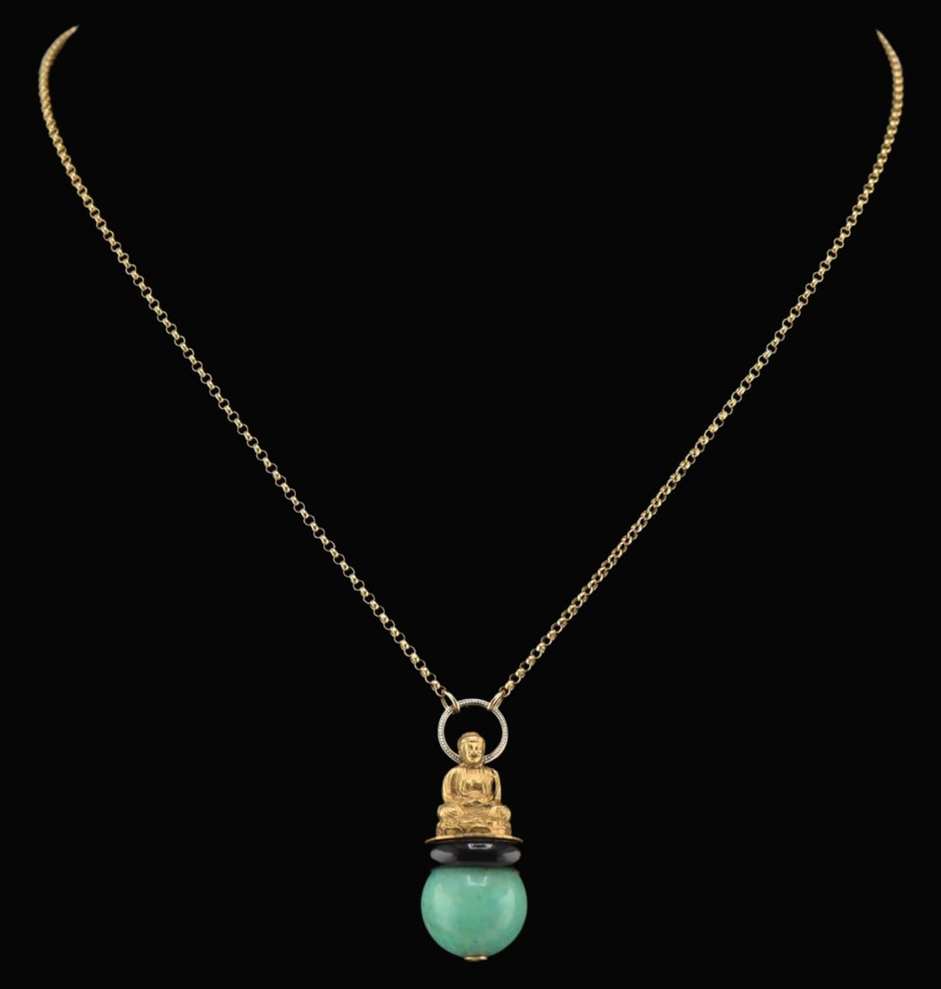 JEWELRY. Van Cleef & Arpels 18kt Gold, Onyx and: Jade Buddha Pendant. Van Cleef & Arpels 18kt yellow gold seated Buddha pendant set atop a polished onyx rondelle and a round polished jade ball; with an 18kt white gold circular bail reminiscent of ty