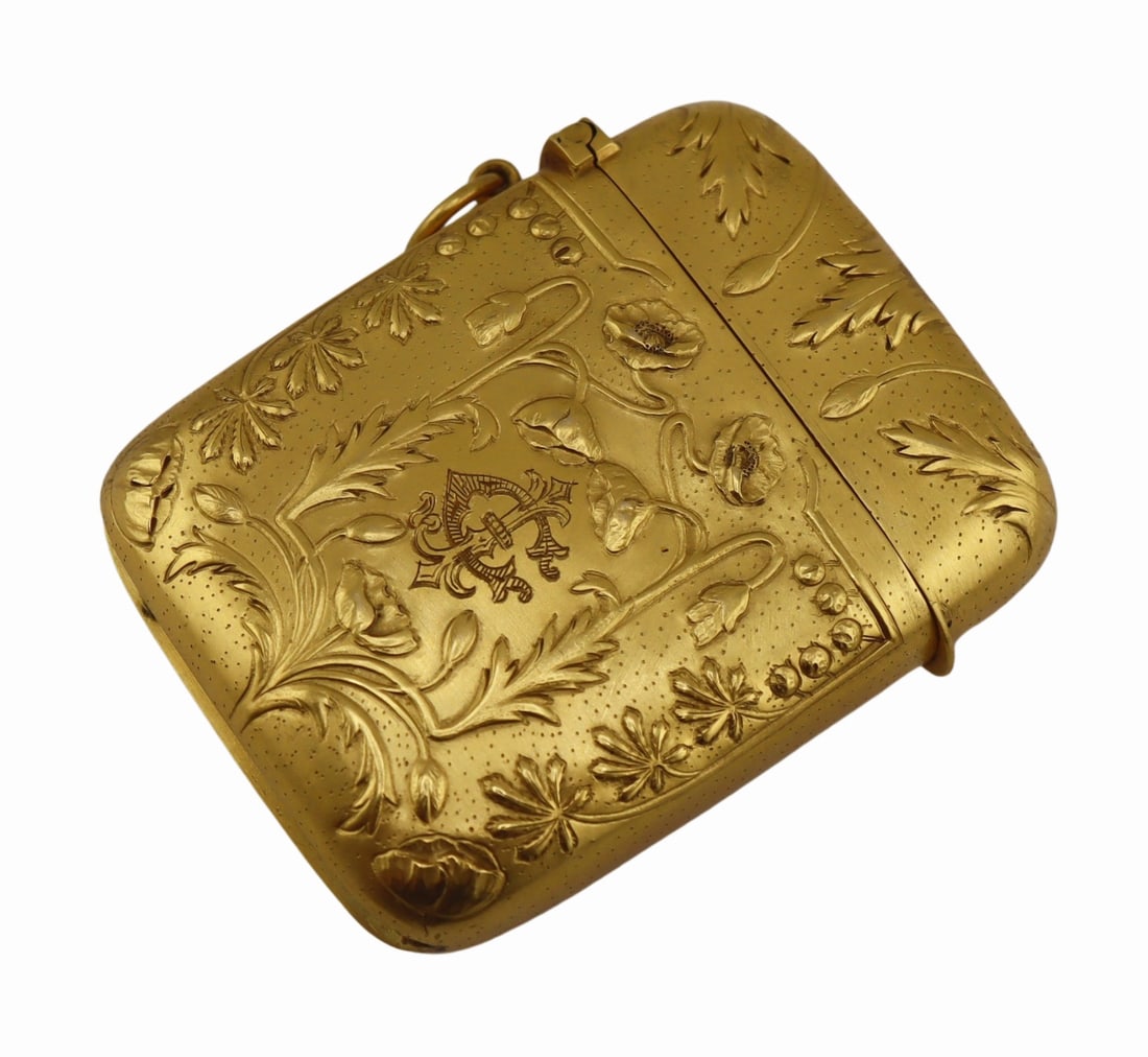 GOLD. French Art Nouveau 18kt Gold Vesta Case.: Monogrammed Art Nouveau French 18kt yellow gold vesta or match case displaying beautiful floral and foliate designs throughout. With double struck domestic French hallmarks of an eagle head signifying