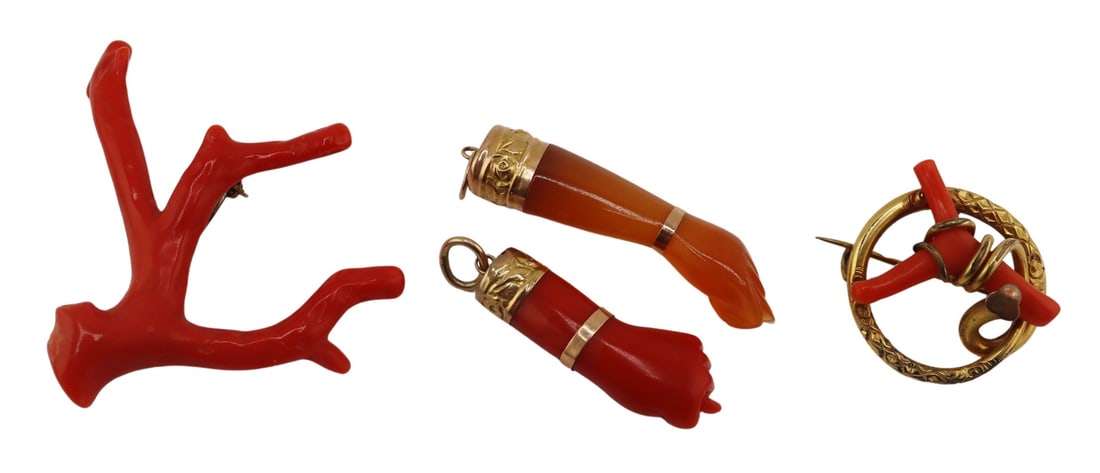 JEWELRY. Collection of Victorian Coral & Carnelian: Includes a Victorian gold-filled and salmon coral branch circular brooch; a n .800 silver gilt mounted red coral branch brooch; an 18kt yellow gold mounted carved coral figa hand pendant; and an 18kt