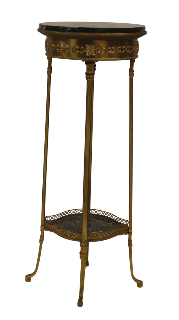 After Maison Jensen Marble Top Bronze Pedestal: Table. From a Manhattan, NY estate. Dimensions: table measures approx. 40" h x 15" w x 11.5" d.