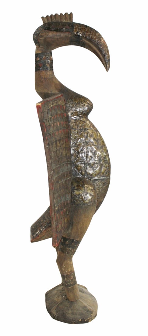 Antique African Senufo Bird Sculpture: Large and very well executed, painted and metal clad. From a Park Ave, NYC estate. - Dimensions: 54" x 21"