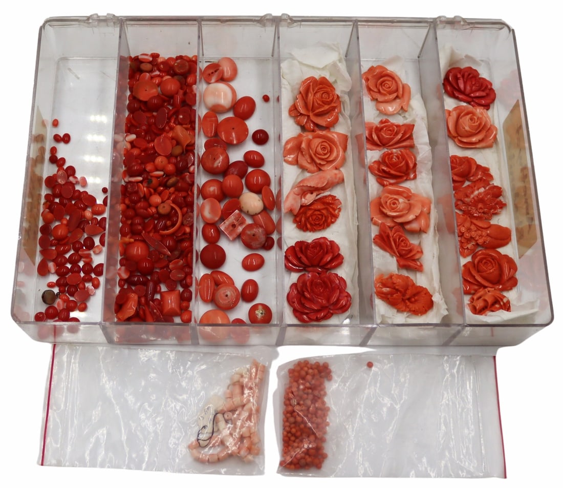 Collection of Carved Coral Pendants and Beads.: Includes (17) carved coral floral pendants; (1) carved coral koi fish pendant; (1) carved coral nef ship pendant; (1) bag of salmon coral beads; (1) partial strand of angel skin coral beads; and assor