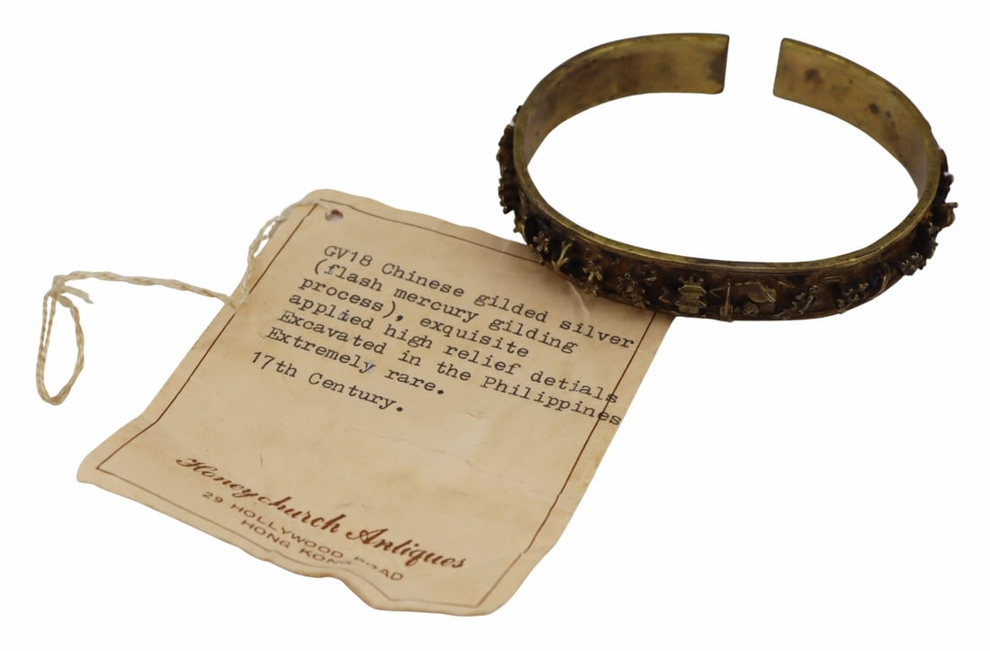 JEWELRY. Antique Chinese Gilt Silver Bracelet.: Accompanied by a Honeychurch Antiques 29 Hollywood Road Hong Kong identification tag reading, "GV18 Chinese gilded silver (flash mercury gilding process), exquisite high relief details Excavated