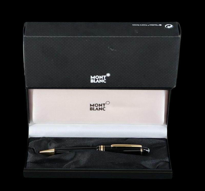 Cased Montblanc Meisterstuck Legrand Ballpoint: Pen. A cased German Montblanc Meisterstuck Legrand ballpoint pen Ref #: 10456. This pen features a resin body executed in black resin, and gold plated hardware. Accompanied by its original box and pap