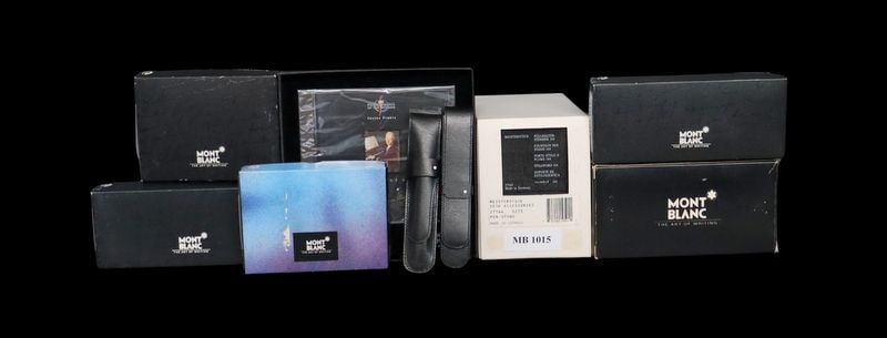 Large Montblanc Accessories Grouping.: Including a cased Montblanc fountain pen stand, Ref #: 27144; a cased Montblanc leather key case, Ref # : 30307; a cased Montblanc leather note book, Ref #: 30650; a cased Montblanc leather (1) slot p