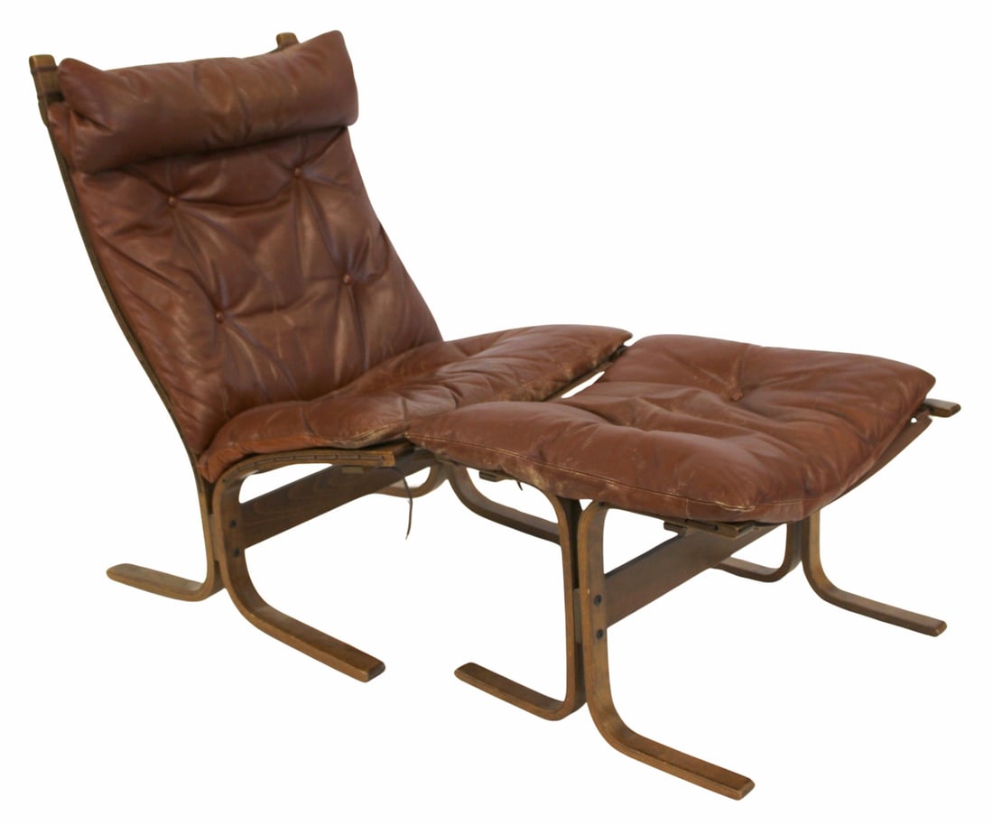 Midcentury Leather Cushioned Chair & Ottoman: From a Spring Valley, NY estate. Dimensions: Chair: 38.5" h x 26.5" w x 32" d. Ottoman: 17" h x 26" w x 22" d. - Dimensions: 31.5" x 22" w x 9.5"