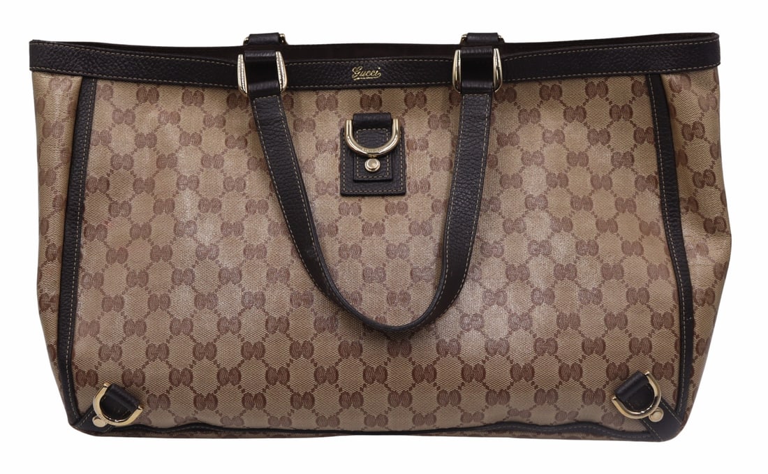 COUTURE. Gucci Abbey D-Ring GG Canvas Tote Bag.: With interior flat pocket and zippered pocket. From a Larchmont, NY estate. Dimensions: purse measures approx. 15.25" w x 5" d x 10.5" h; strap drop measures approx. 8".